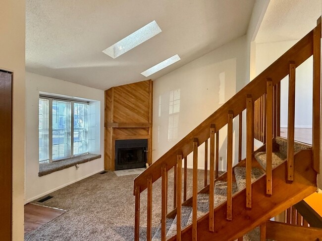 Building Photo - Open Tri-Level Townhome With Tons Of Space...