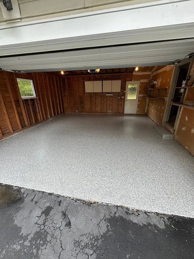 Garage with new epoxy - 23 Roxwell Ct