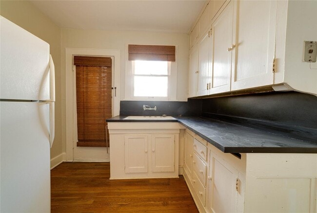 Building Photo - One side of Duplex Available- 2 Bedroom- 1 Bath Tudor Minutes from TCU- 76109