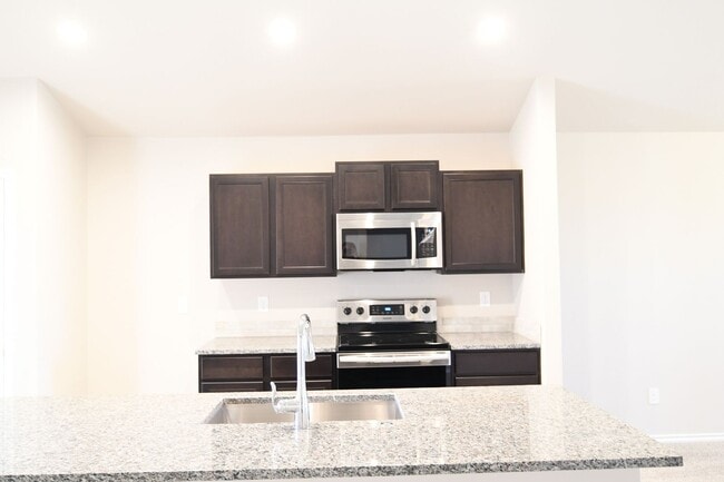 Building Photo - Beautiful Brand New Custom Brick Home 3 bed/ 2 bath/ 2 car garage Open Concept with huge backyard...