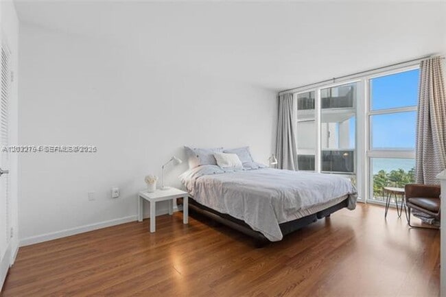 Building Photo - 10275 Collins Ave