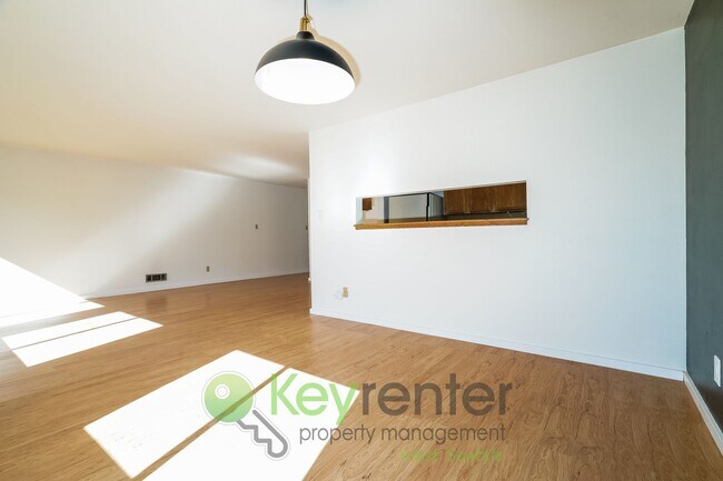 Building Photo - Remodeled Two-Bedroom with Open Floor Plan...