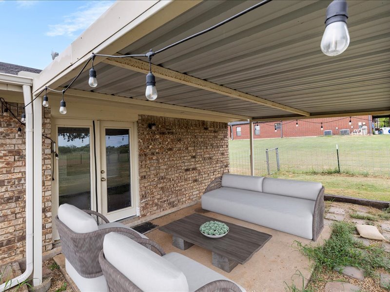 covered patio in back - 9395 Green Springs Cir