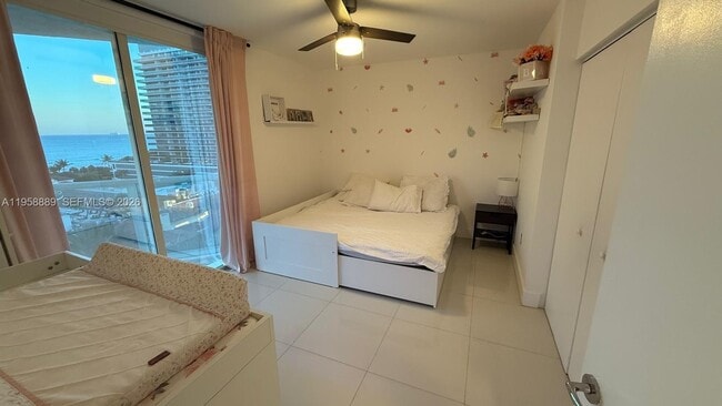 Building Photo - 5900 Collins Ave