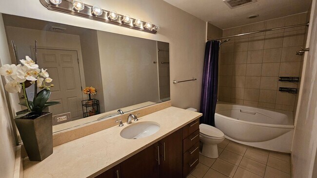 Building Photo - ***GORGEOUS FURNISHED 1 BEDROOM CONDO AT A...