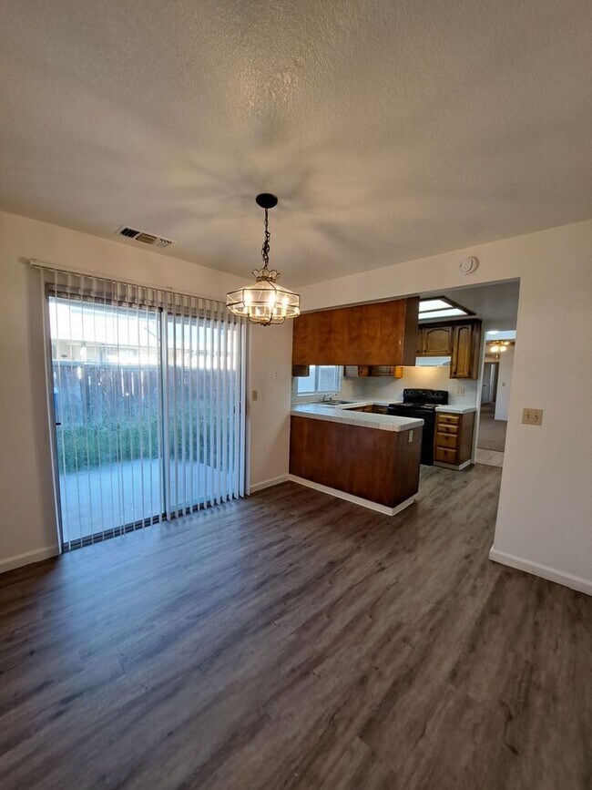 Building Photo - Spacious 3-Bedroom Home Steps from Addams ...