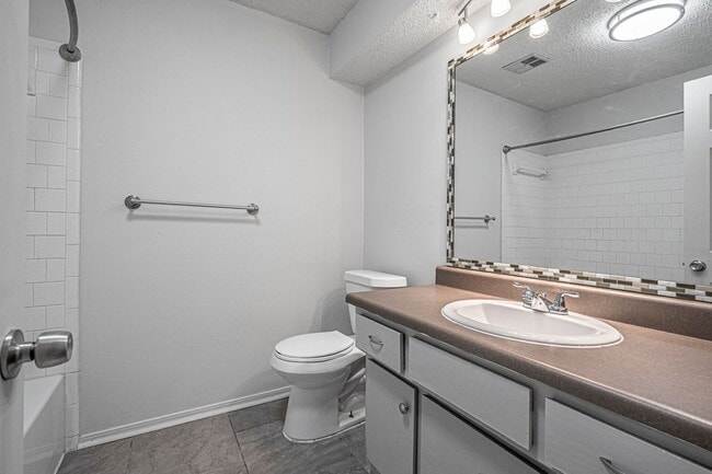 Building Photo - Corner-Lot 3Bedroom Charmer in Yukon with Fireplace & Enclosed Patio!