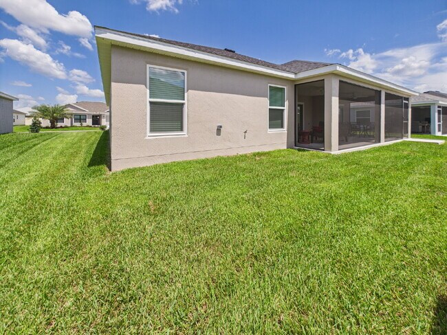 Building Photo - Furnished 3/2 in Water’s Edge | Golf Cart ...