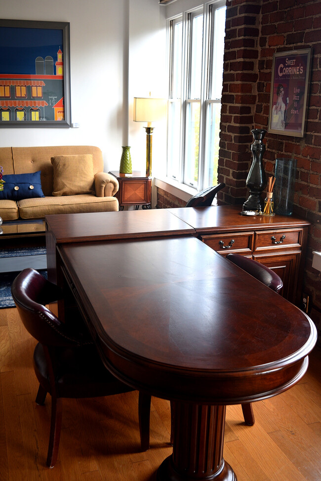 Large L-shaped desk with power - 229 N Poplar St