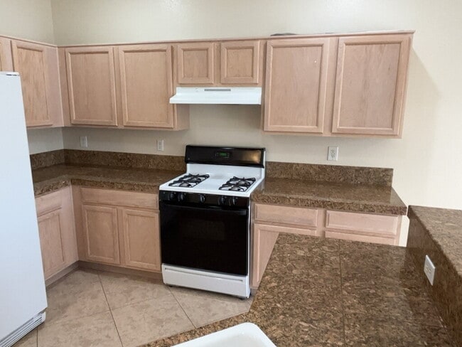 Building Photo - This beautiful two-story home is located in a gated community.