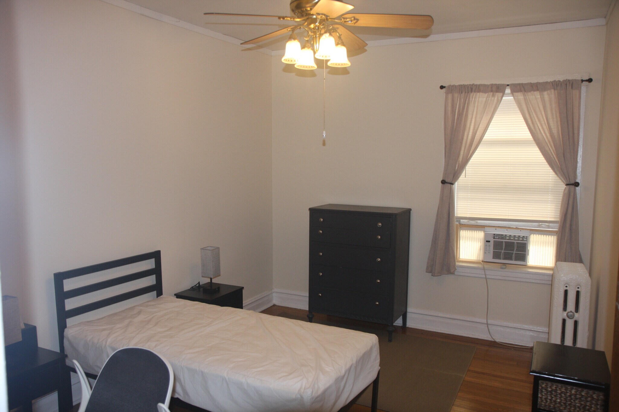 A/C units installed and removed seasonally - 1417 W Rosemont Ave