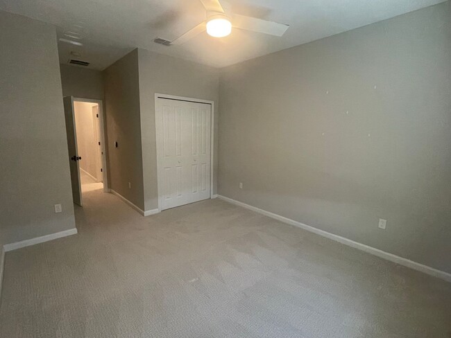 Building Photo - Practically New Townhome in Growing Area