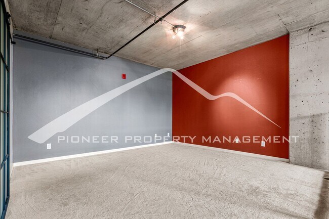 Building Photo - Modern Industrial Condo Downtown with Park...