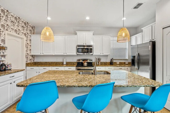 Building Photo - 8964 Bismarck Palm Rd