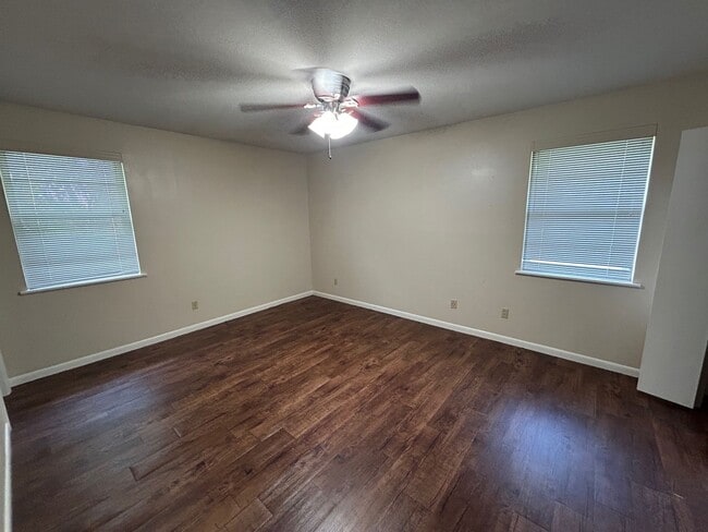 Building Photo - Beautiful Corner Lot Living