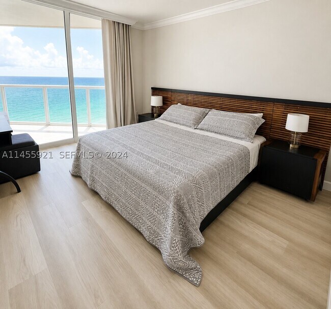 Building Photo - 16699 Collins Ave