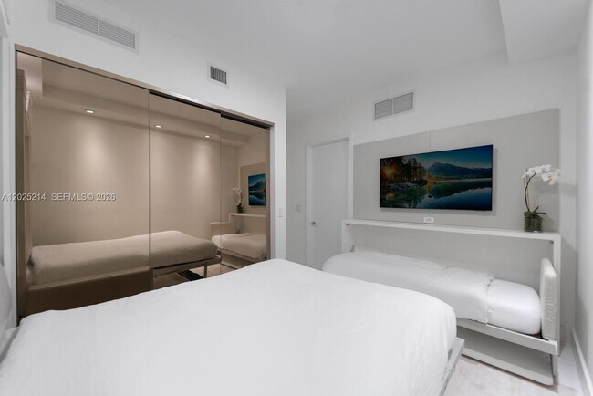 Building Photo - 10203 Collins Ave