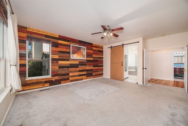 Building Photo - Welcome to this STUNNING 4-bedroom, 2.5-ba...