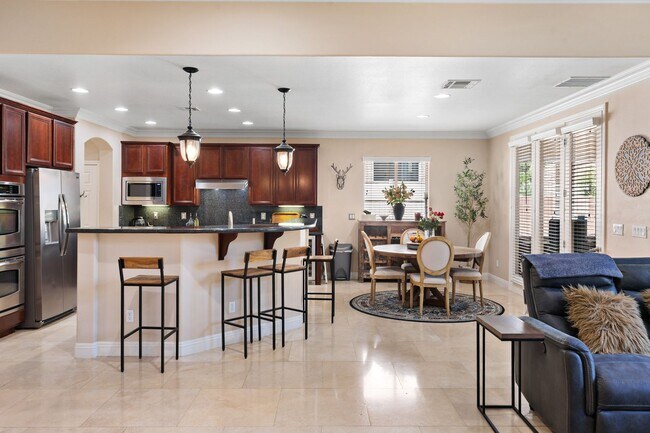 Building Photo - Spacious Mountain’s Edge Home with Den, Sunroom, 3-Car Garage & Private Spa Retreat