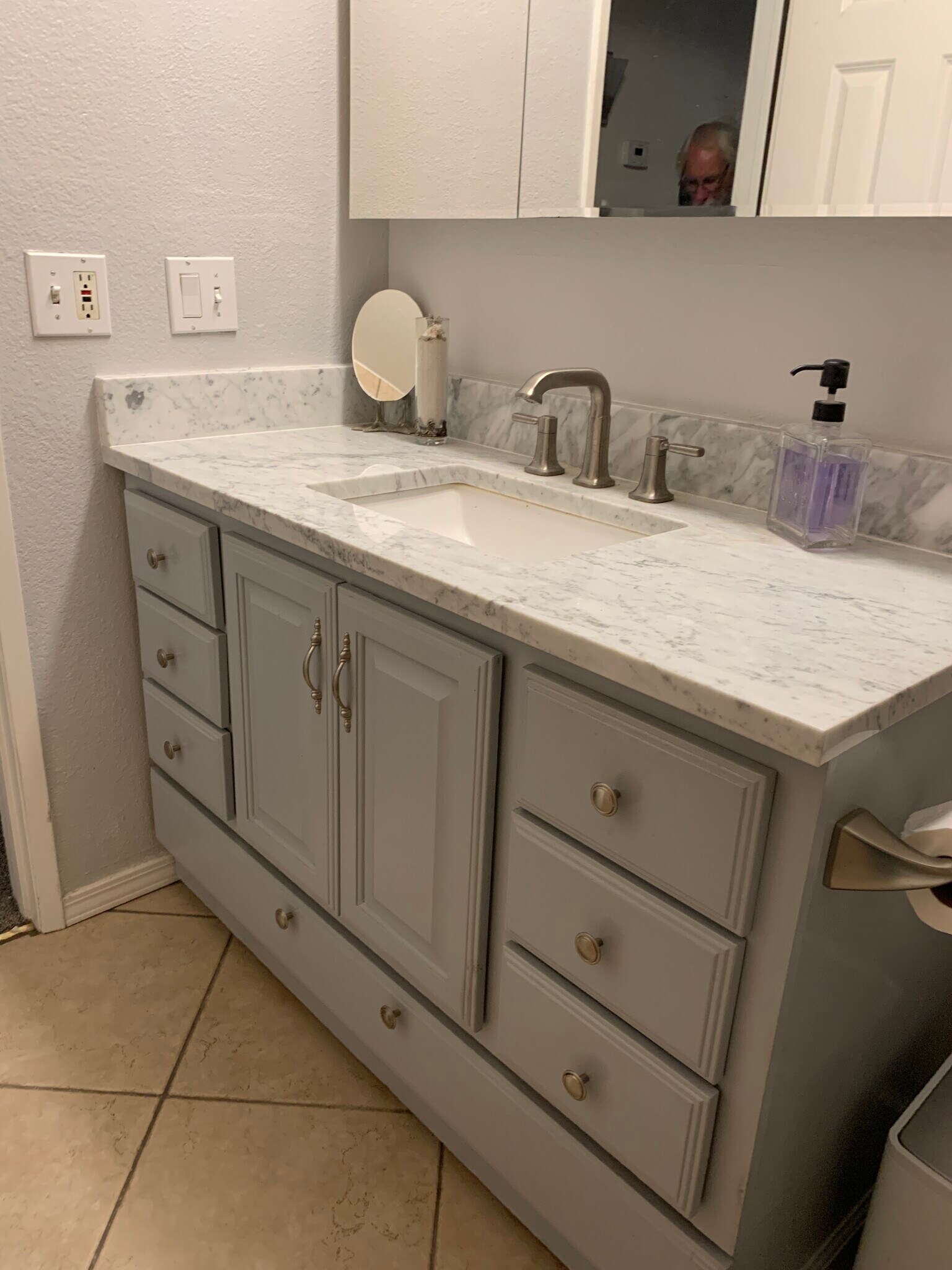 Updated bathroom vanity with new marble top and sink - 436 N Bellflower Blvd