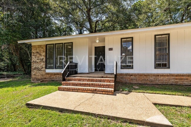 Primary Photo - Beautifully Updated 3-Bedroom Home with Granite Kitchen & Sunroom Retreat!