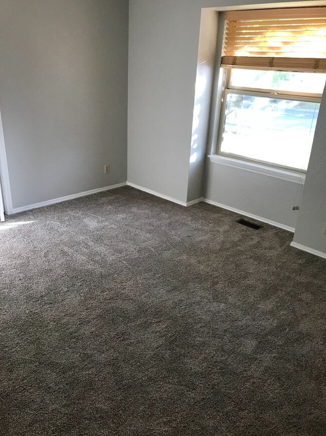 Building Photo - Coming in March – Beautiful Single-Story Home with Dual Living Spaces & Fenced Yard