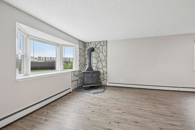 Building Photo - Townhome-Style Living with Greenbelt Views, Attached Garage & Community Pool!