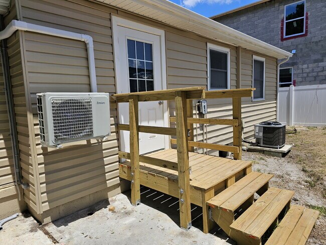 Building Photo - fully renovated 2-bedroom, 1-bathroom home with bonus guest room or office and oversized fenced yard