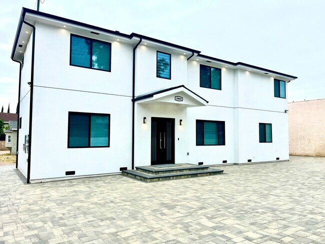 Primary Photo - Newly built gated home with top of the lin...