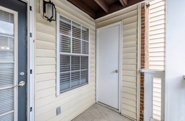 Building Photo - Spacious 2-Bedroom Elite Apartment with Private Balconies & Washer/Dryer