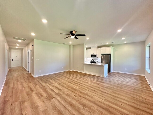 Building Photo - Tour Today! New Construction 4 Bed 2 Bath Triplex!