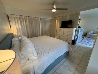 Another view of King size bed with dresser and covered closet spaces. - 444 Nahua St