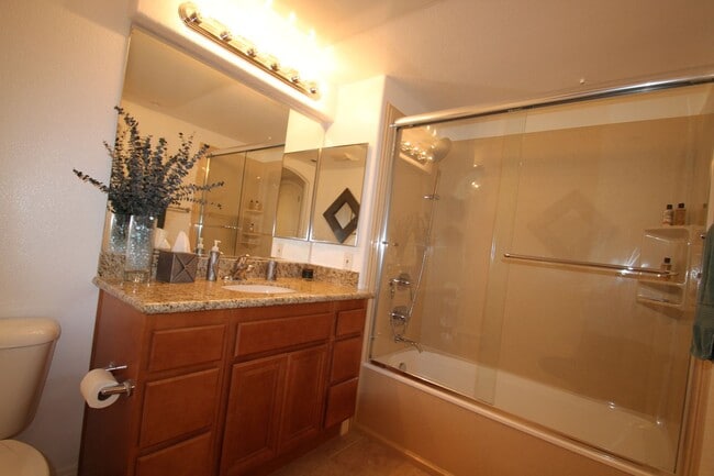 Building Photo - $1000 MOVE IN SPECIAL! Large, Updated 2 BD, 2 BA Condo w/ EV CHARGING