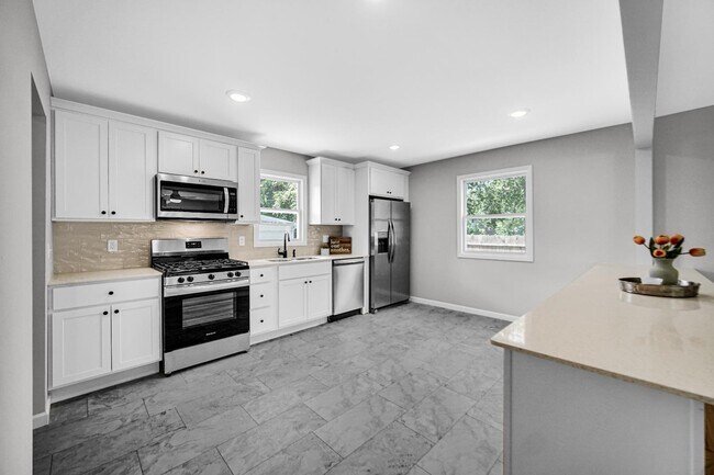 Building Photo - 3413 W 77th Ave