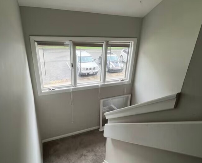 View of the free parking curb-side steps to front door - 334 Shenandoah Cir