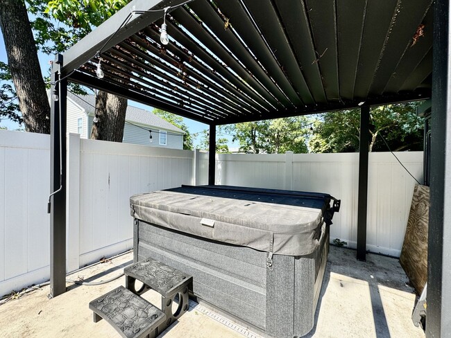 Building Photo - Ready NOW! A Custom Townhouse-Style Duplex Blocks to the Beaches! Fenced Yard - Hot Tub - Pet Fri...