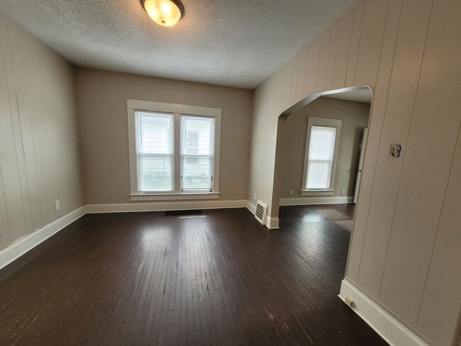 Building Photo - Two bedroom home with partially fenced yard!