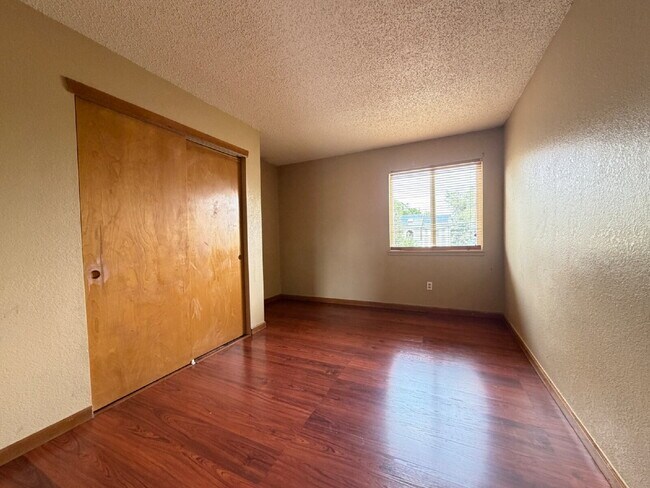 Building Photo - ~Available Now~  Beautiful Four Bedroom Home with Fireplace, Private Yard & Luxurious Primary Suite!