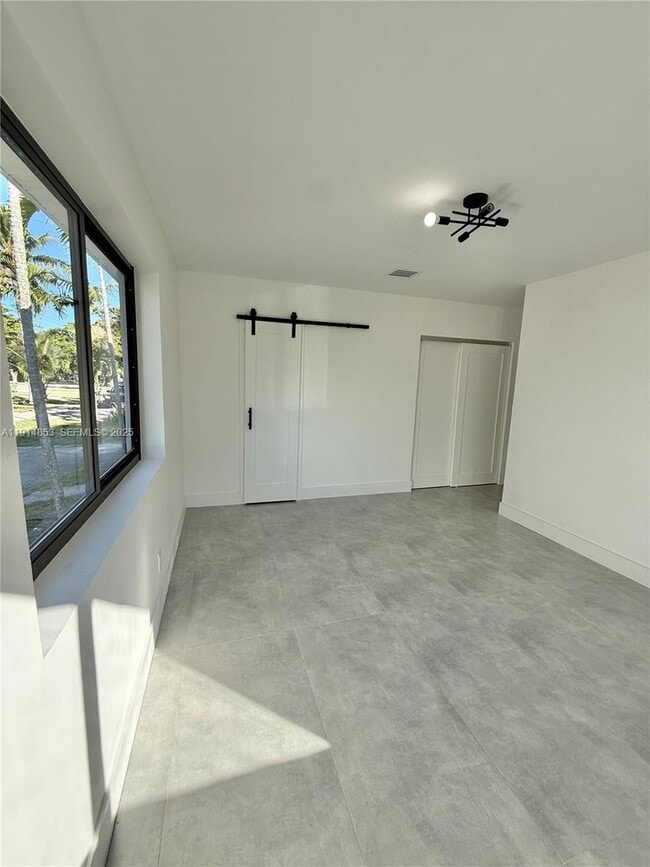 Building Photo - 12615 N Miami Ave