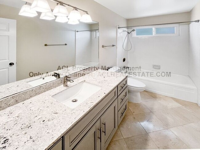 Building Photo - Bright 2BR/2BA Condo with Garage & Pool in...