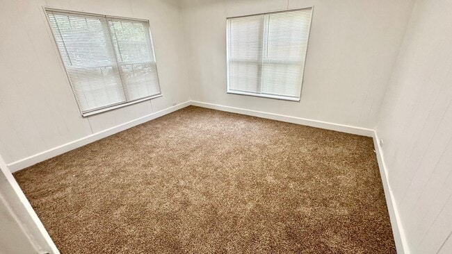 Building Photo - Spacious 3 Bedroom Home with Modern Updates & Shop