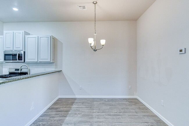 Building Photo - Brand New Construction! Lawn care provided!