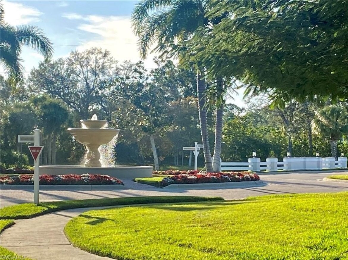 Beautiful fountain at the entrance of this beautiful gated community - 6910 Satinleaf Rd N
