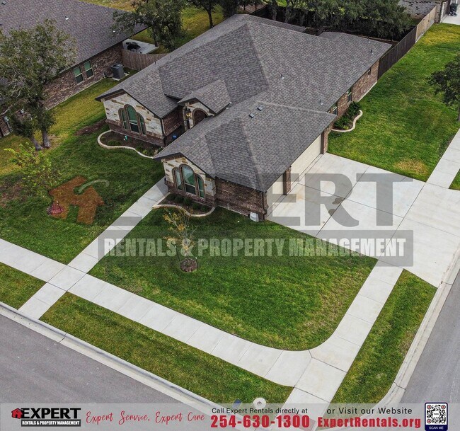 Building Photo - Elegant Corner-Lot Retreat with Upgraded F...