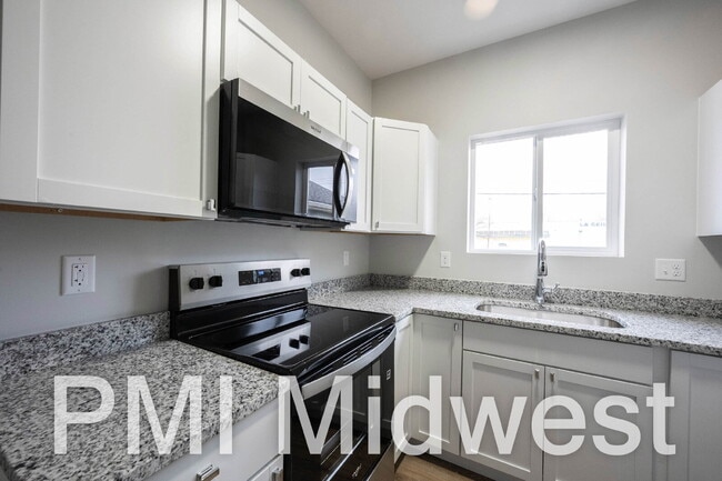 Building Photo - "Charming 2-Bedroom Gem with 1.5 Baths on East Michigan Street – A Cozy 949 Sq. Ft. Haven in Indi...