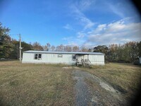 Building Photo - 2 BR 2 Bath 1,120 sq ft singlewide mobile home on 1.03 acres in Lonoke, AR