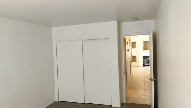 Building Photo - Townhome with Loft + Two Bedrooms/Baths - Designed for Comfort in Gated Community