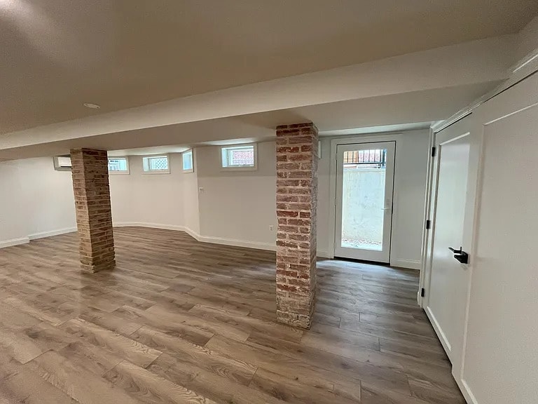 Front entry door along the side yard allows light into the space. - 1755 Lamont St NW