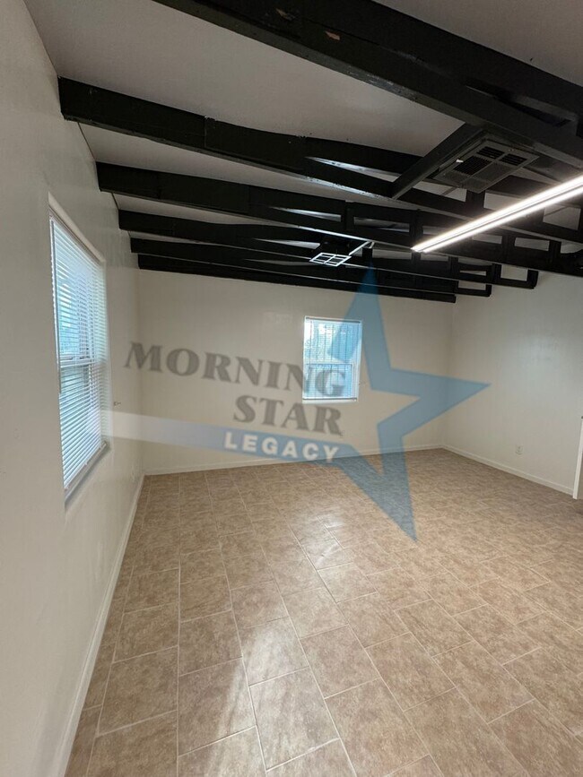 Building Photo - Charming Updated Home w/ Enclosed Yard & Storage