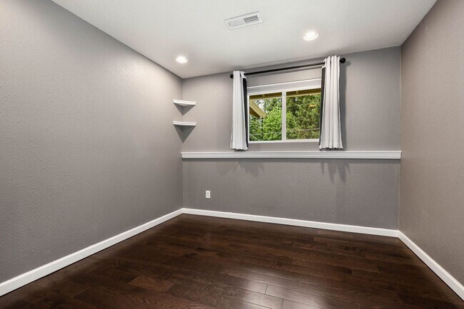 Building Photo - Updated Charmer with Open Kitchen, Private Yard & 2-Car Garage